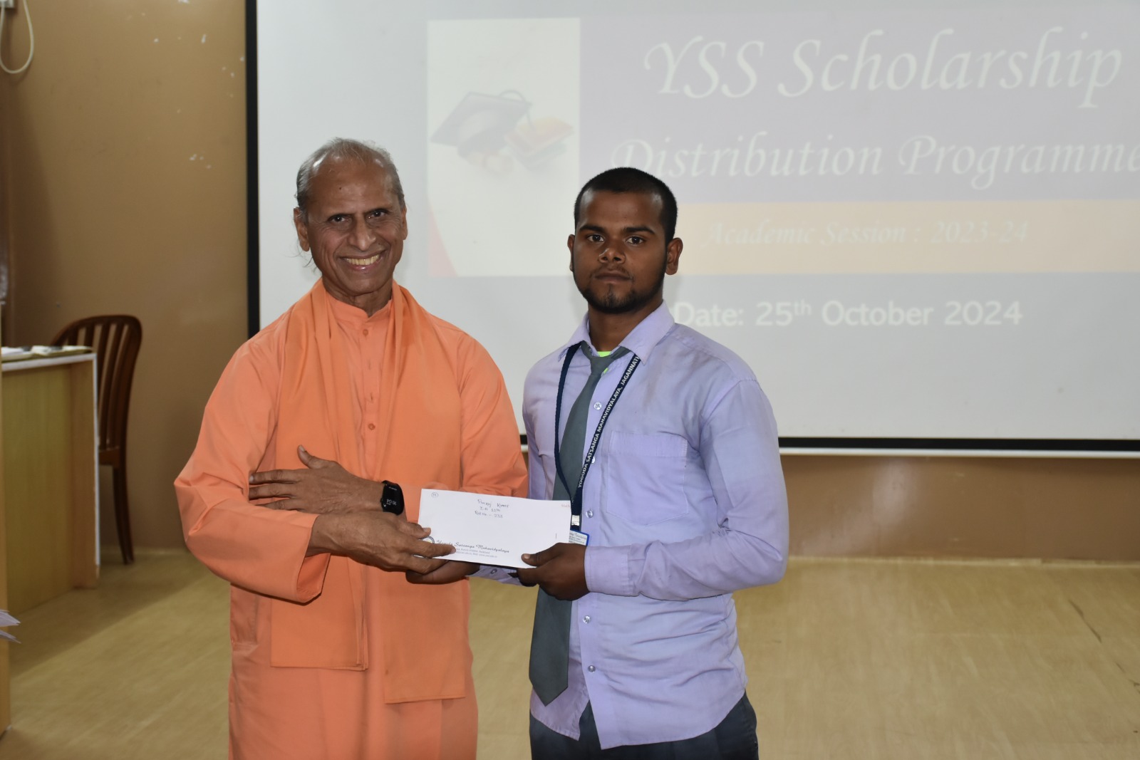 Scholarship Distribution: Reverend Swami Sudhanandji, with his blessing graced the occasion and distributed scholarships.